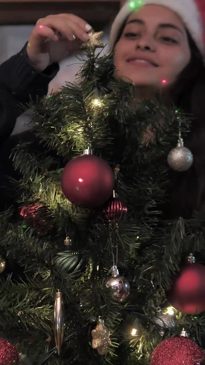 Free Stock Video Woman Decorates Christmas Tree At Home Live Wallpaper - Free Download