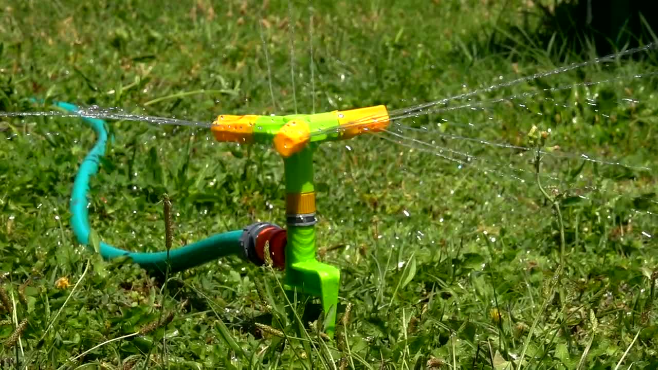 Free Video Stock Sprinkler Watering The Grass Live Wallpaper - Free Download