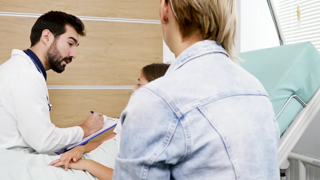 Stock Video Doctor Questions Young Girl On Hospital Bed Live Wallpaper For PC - Free Download