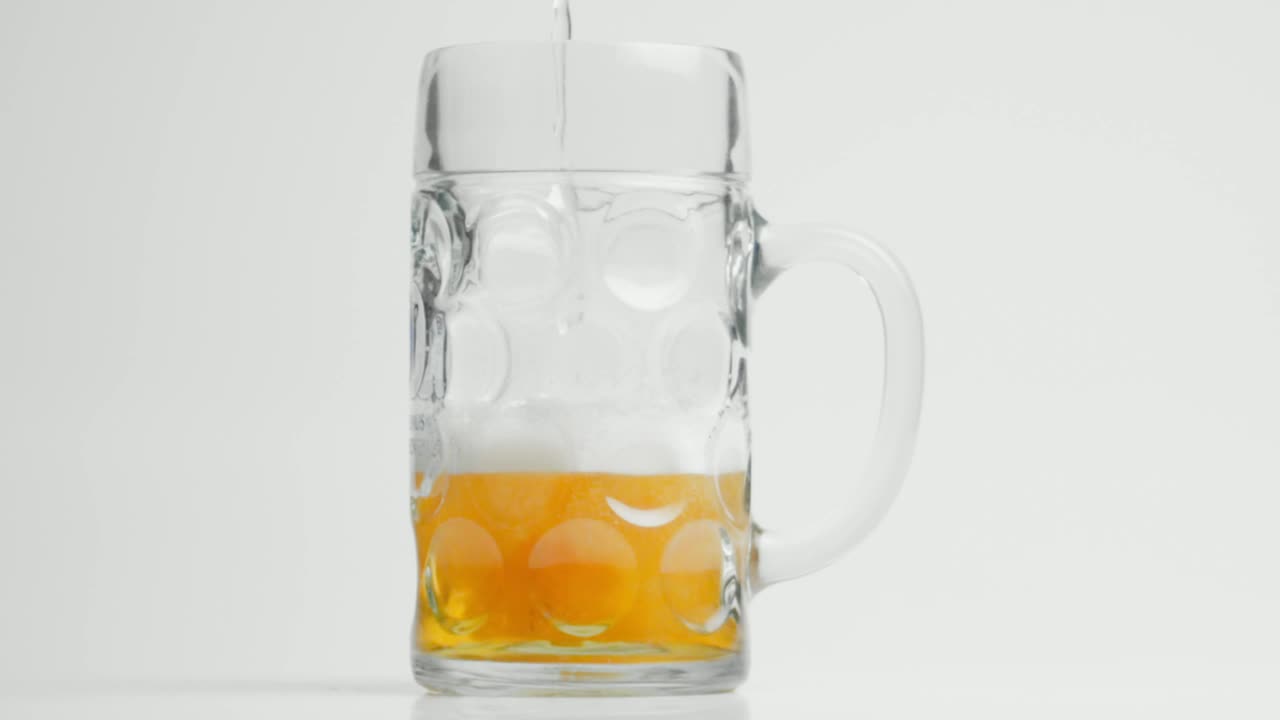 Stock Video Foaming Beer Being Poured Into A Glass Live Wallpaper For PC - Free Download