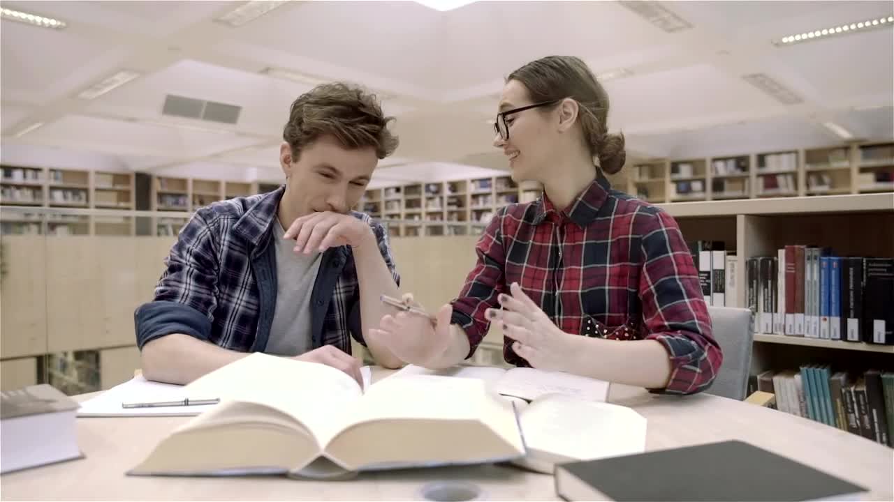 Free Video Stock Students Having Fun In The Library With The Books Live Wallpaper - Free Download