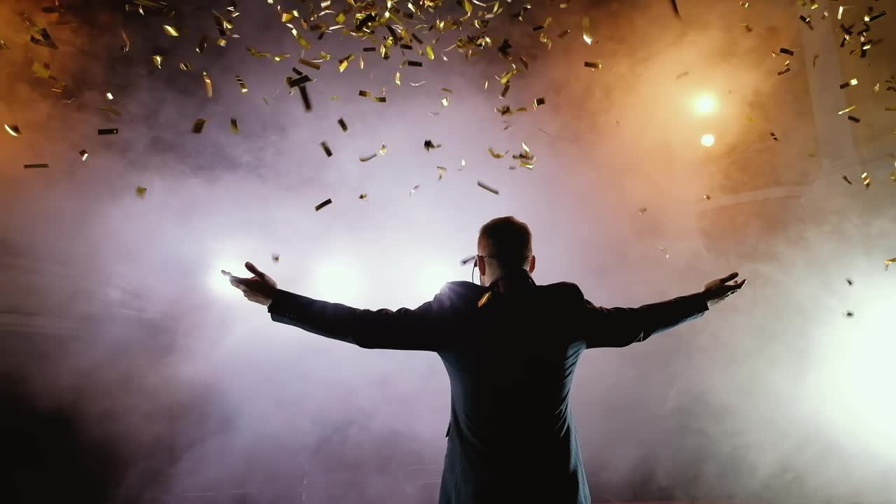Free Video Stock Speaker With Arms Ups At The End Of A Presentation Live Wallpaper - Free Download