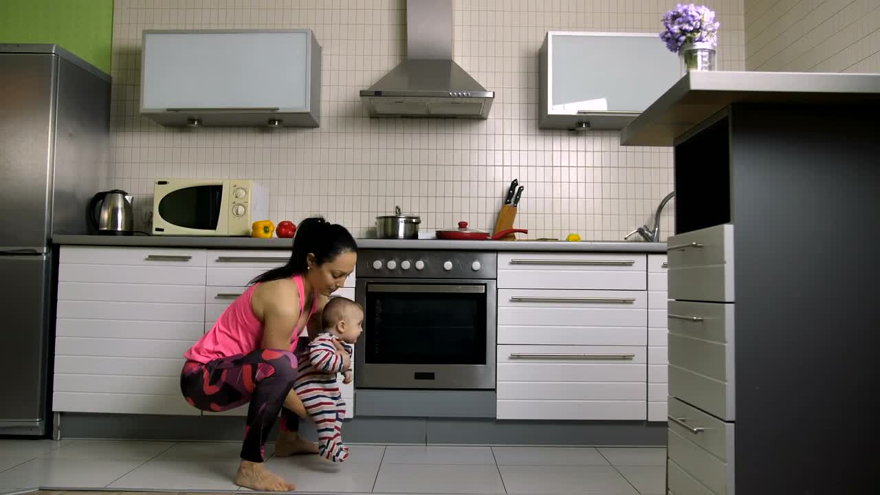 Free Stock Video Woman Doing Squats With Her Baby In Arms Live Wallpaper - Free Download