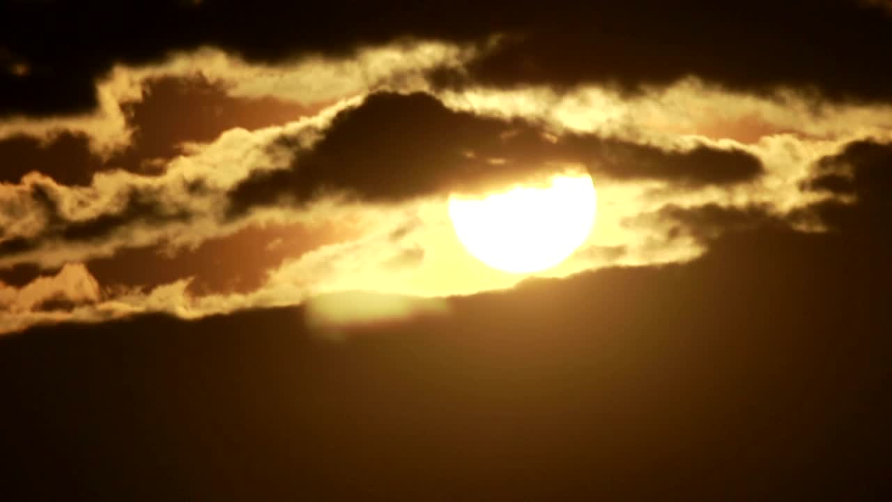 Free Video Stock sunshine appearing behind the clouds Live Wallpaper - Free Download