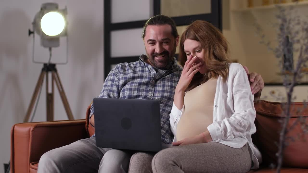 Stock Video Couple Watching A Funny Movie Live Wallpaper For PC - Free Download