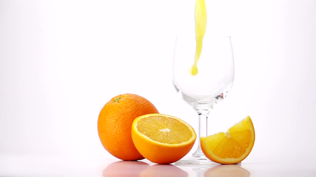Video Stock Pouring Orange Juice Into A Glass White Background Live Wallpaper Free - Free Download