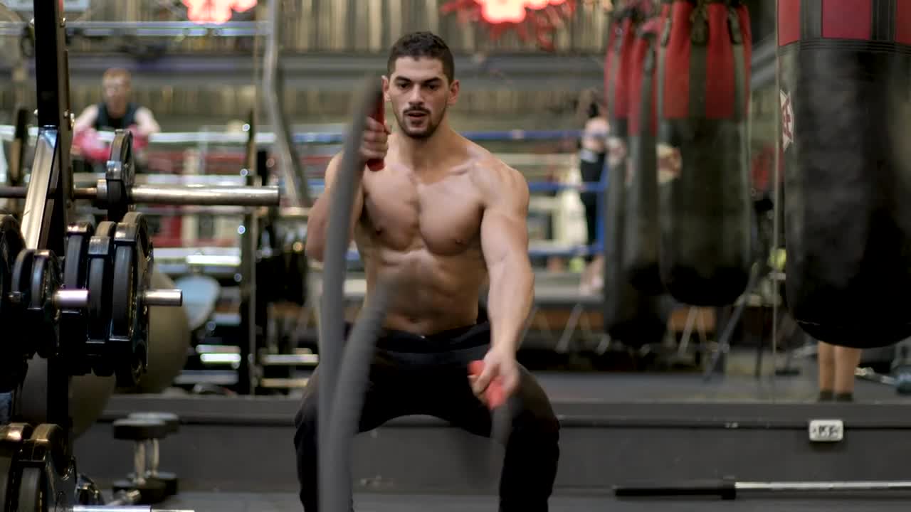 Stock Video Fitness Man Working Out With Ropes Live Wallpaper For PC - Free Download