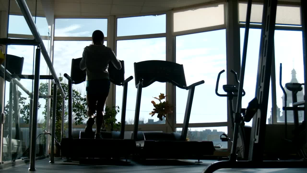 Free Stock Video Silhouette Of A Woman Running In The Treadmill Live Wallpaper - Free Download