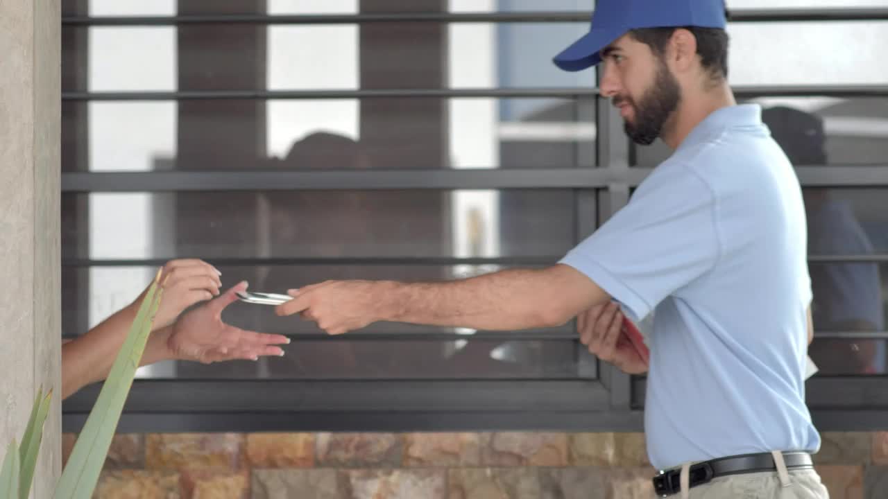 Free Stock Video Young Postman Delivers A Box To A Woman At The Live Wallpaper - Free Download