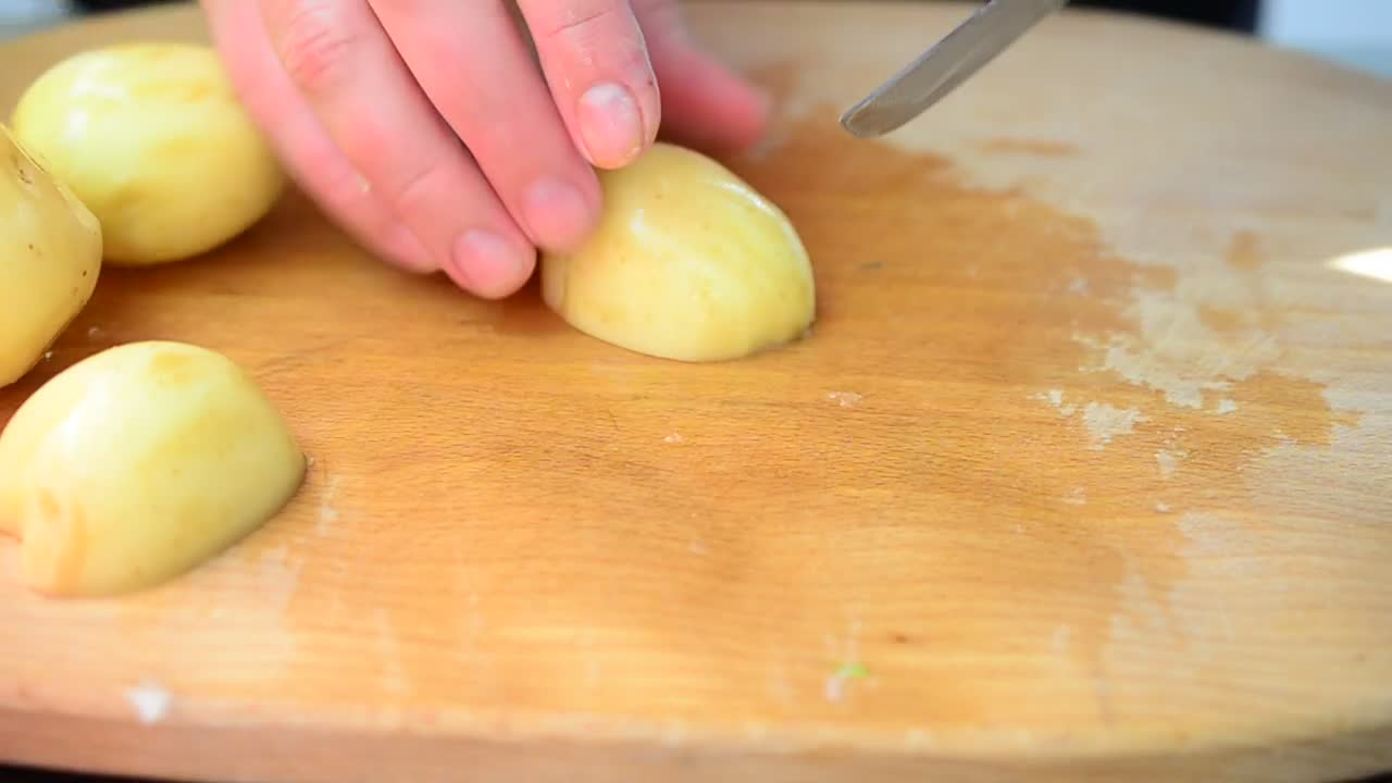 Free Video Stock Slicing Raw Potatoes On A Table Live Wallpaper - Free Download