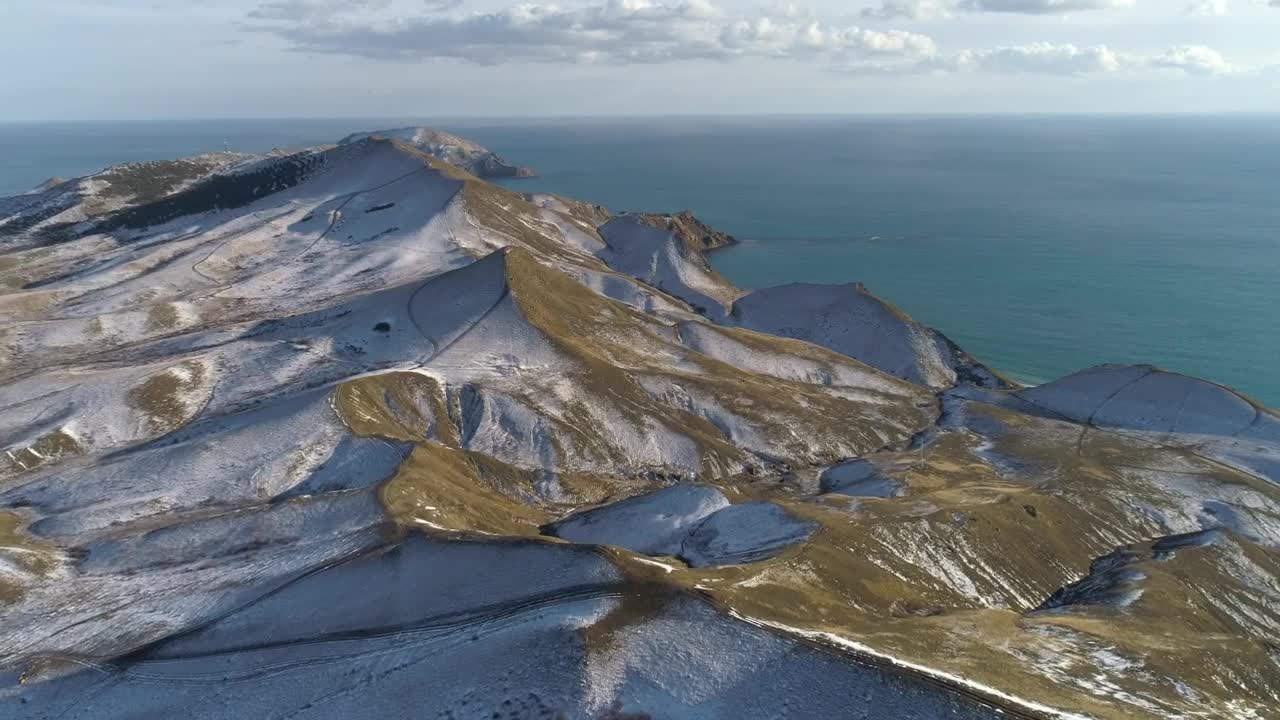 Free Video Stock Snow Topped Hills By The Ocean Live Wallpaper - Free Download