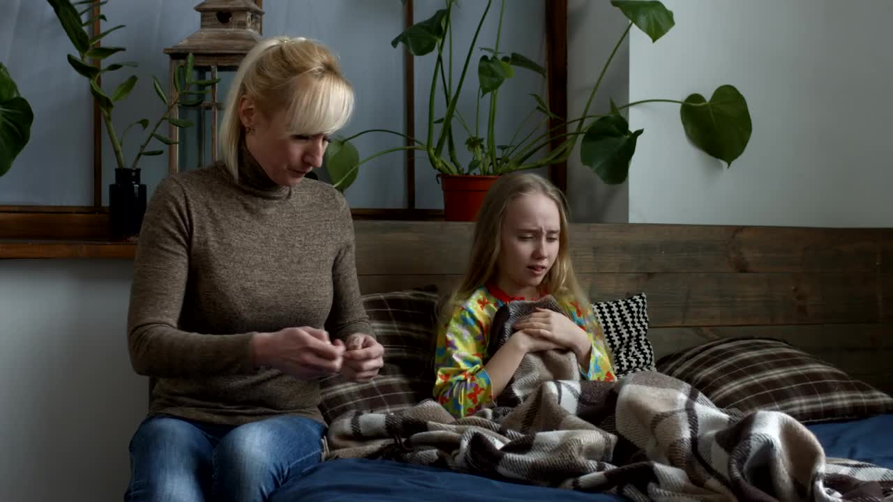 Stock Video Mother Attending To Her Sick Daughte Animated Wallpaper - Free Download