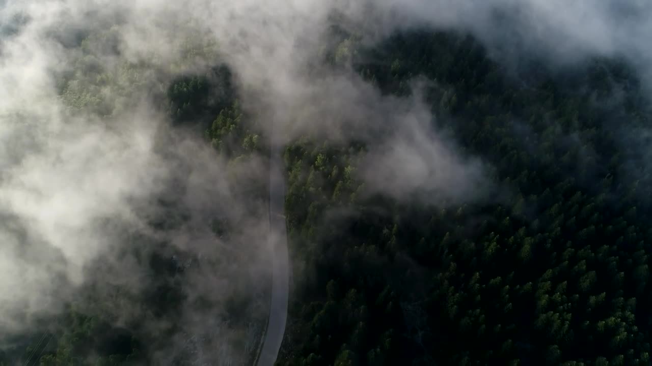 Stock Video Clouds Parting Over A Mountain Road Live Wallpaper For PC - Free Download