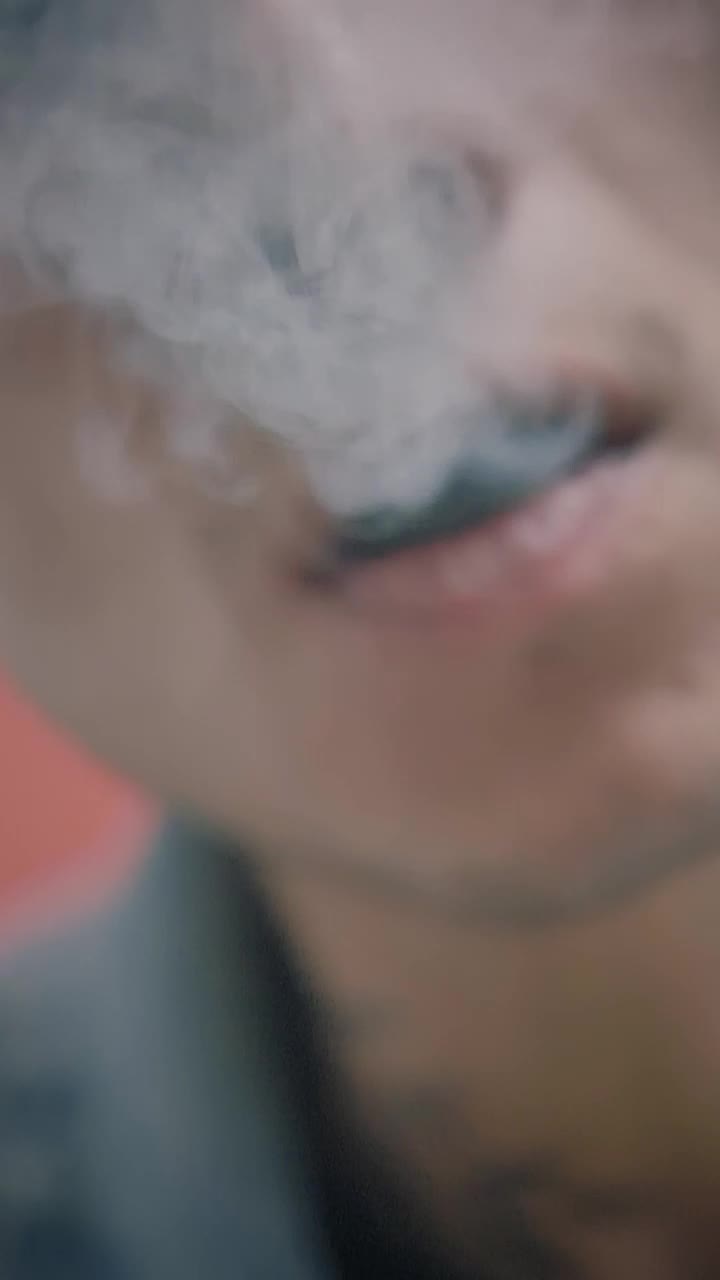 Stock Video Man Exhaling Marijuana Smoke Animated Wallpaper - Free Download
