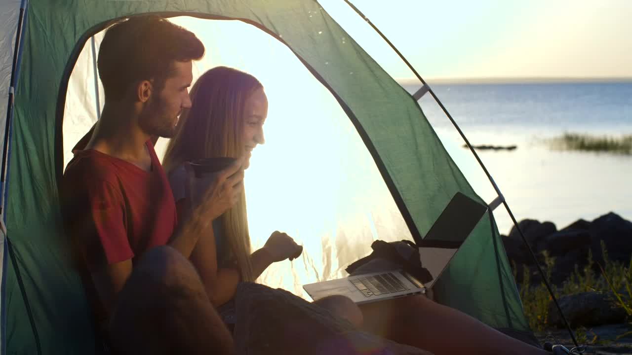 Stock Video Couple Having A Video Call While Camping Live Wallpaper For PC - Free Download