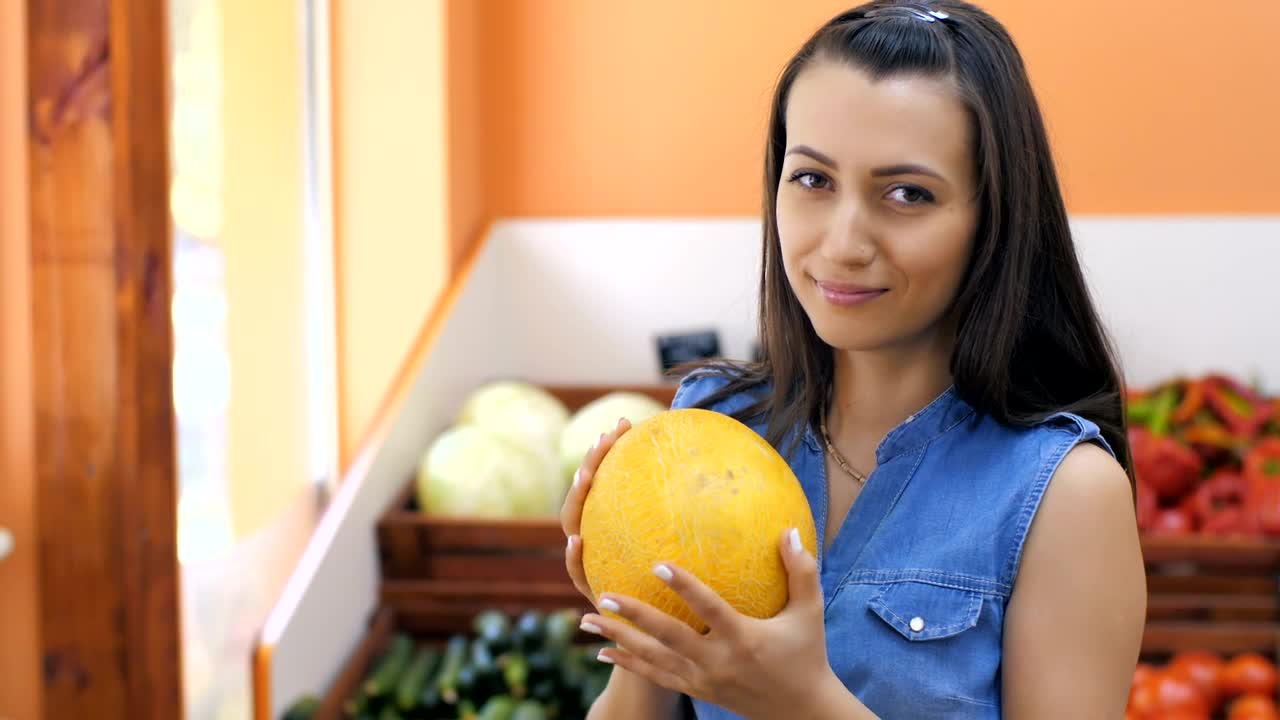 Stock Video Housewife Choosing Fruit At The Market Animated Wallpaper - Free Download
