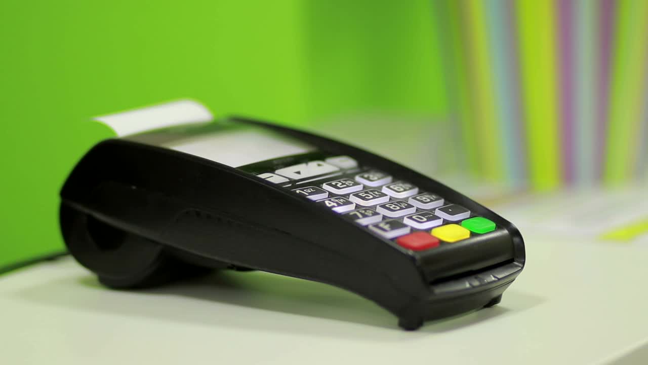 Stock Footage Using A Bank Terminal During A Card Payment Live Wallpaper - Free Download