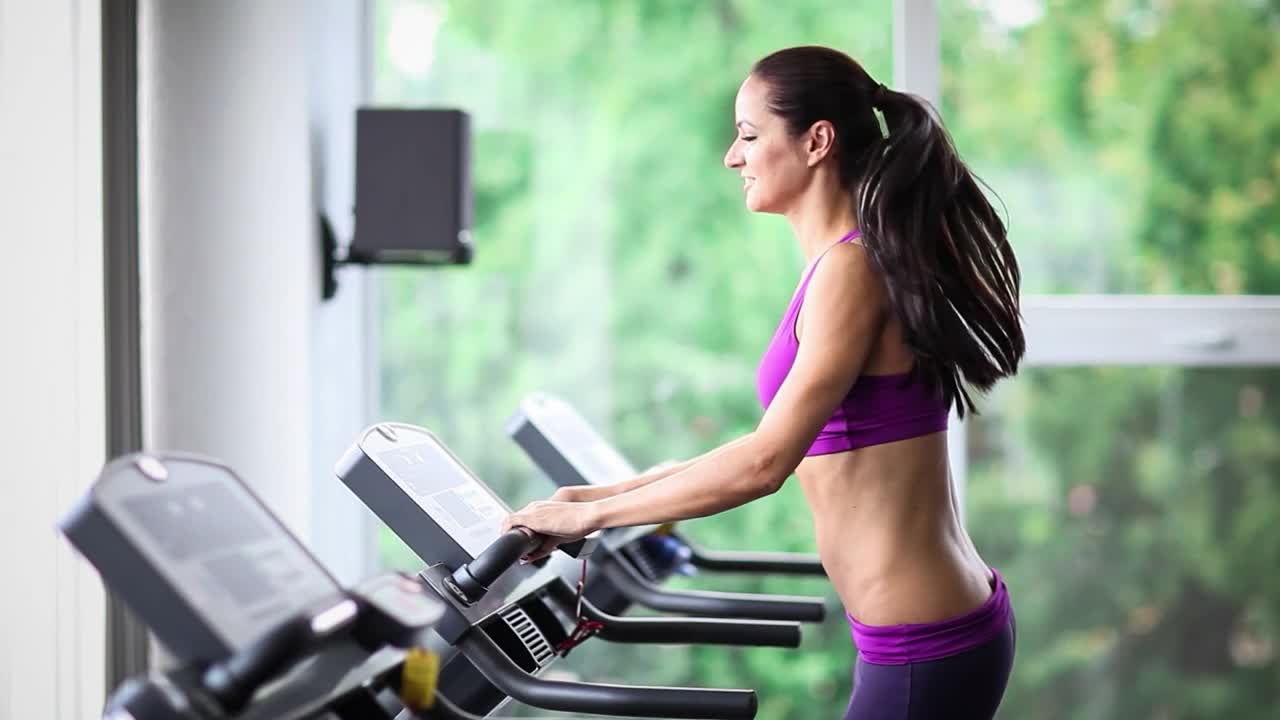 Stock Video Fitness Girl On The Treadmill At The Gym Live Wallpaper For PC - Free Download
