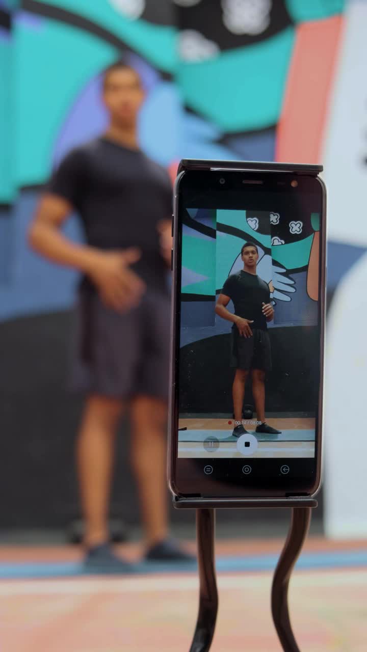 Stock Video Person Is Filmed Exercising With A Cell Phone Live Wallpaper - Free Download