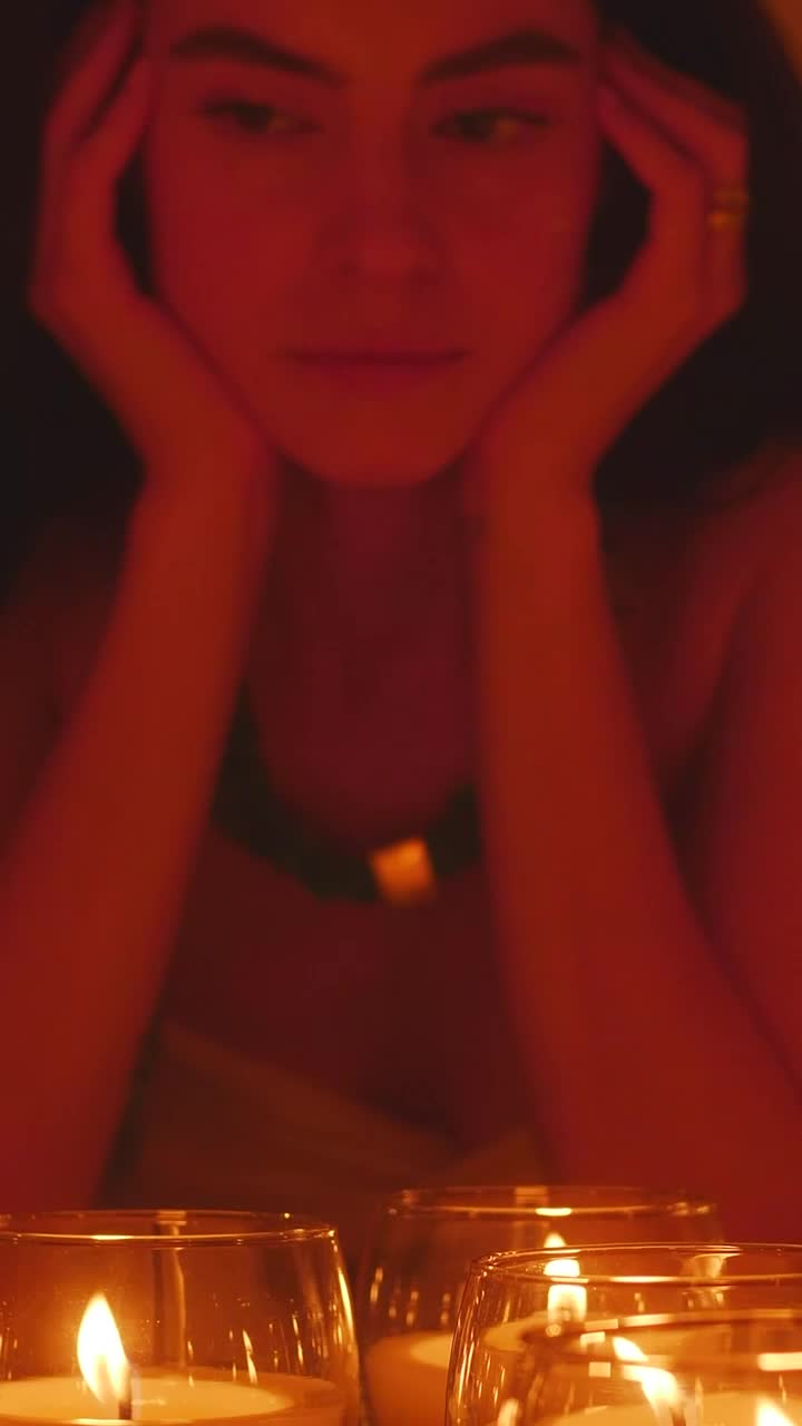 Stock Video Meditative Face Of A Young Spiritual Woman Appreciating Some Burnin Animated Wallpaper - Free Download