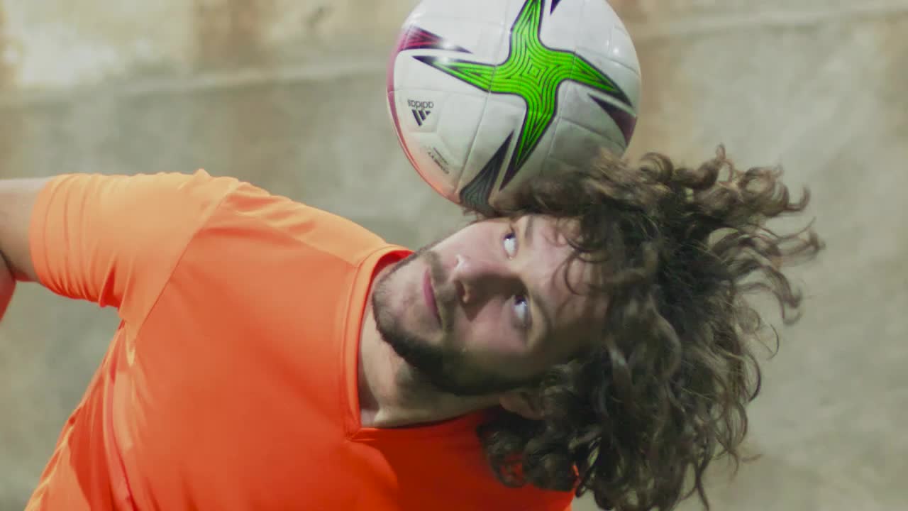 Free Video Stock Soccer Player Juggling A Ball With His Head Live Wallpaper - Free Download