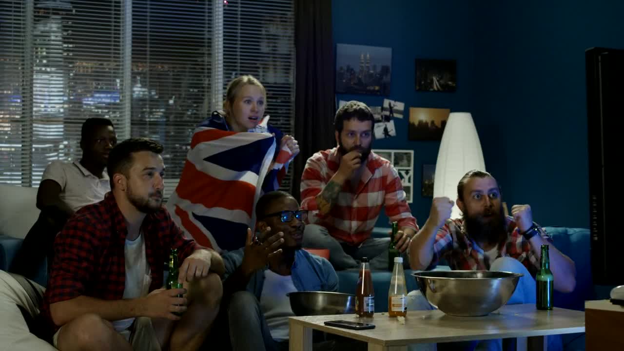 Stock Video Disappointed Fans Watching Sports On The Tv Live Wallpaper For PC - Free Download