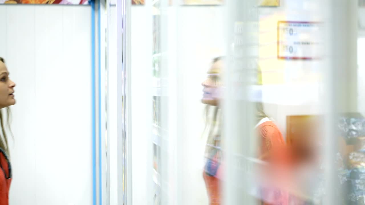 Stock Footage Woman Choosing A Cosmetic Product Live Wallpaper - Free Download