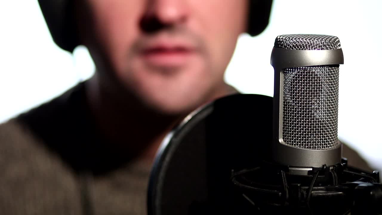 Stock Video Man Using A Microphon Animated Wallpaper - Free Download