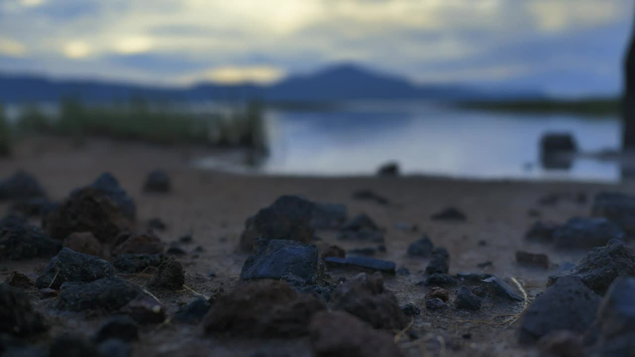 Free Stock Video Shore Of A Calm Lake With Sand Grass And Rocks Live Wallpaper - Free Download