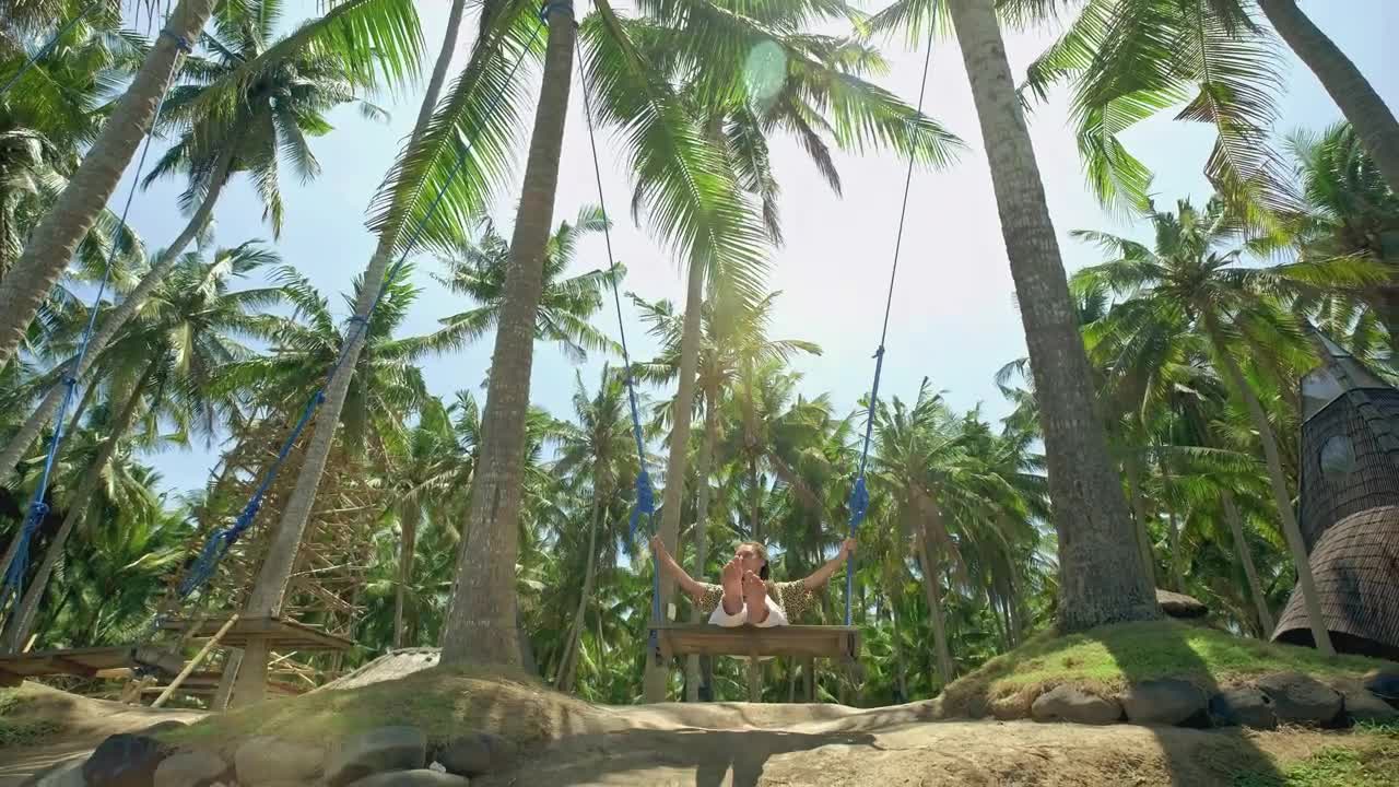 Free Stock Video Woman Swinging In The Jungle On The Beach Live Wallpaper - Free Download