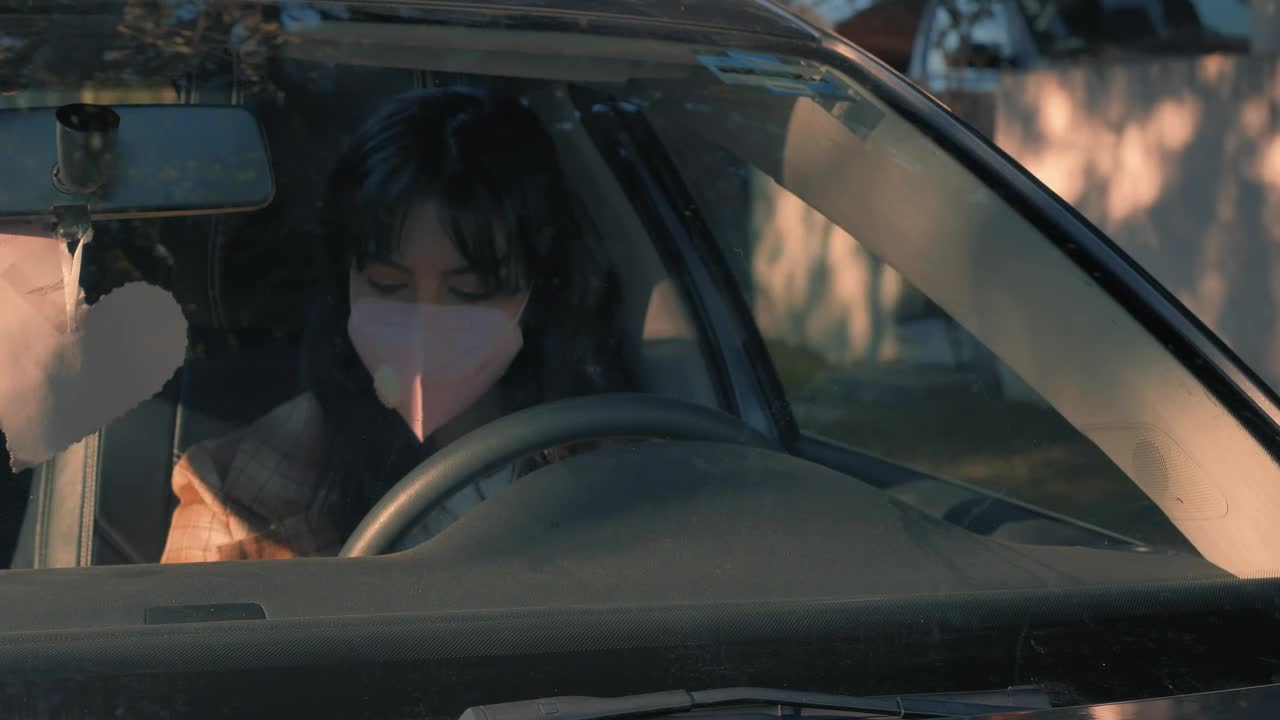 Free Stock Video Woman Wearing A Face Mask Parking Her Car Live Wallpaper - Free Download