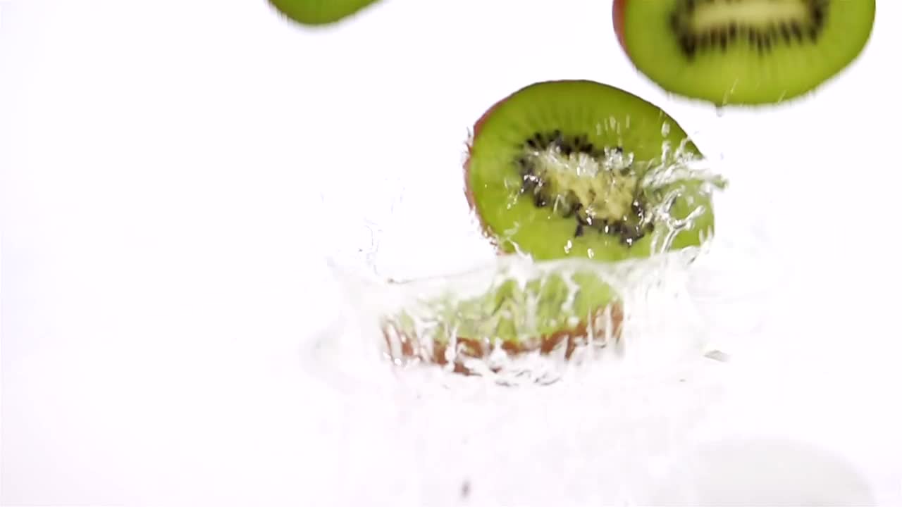 Free Video Stock Slices Of Kiwi Falling Into Water Live Wallpaper - Free Download