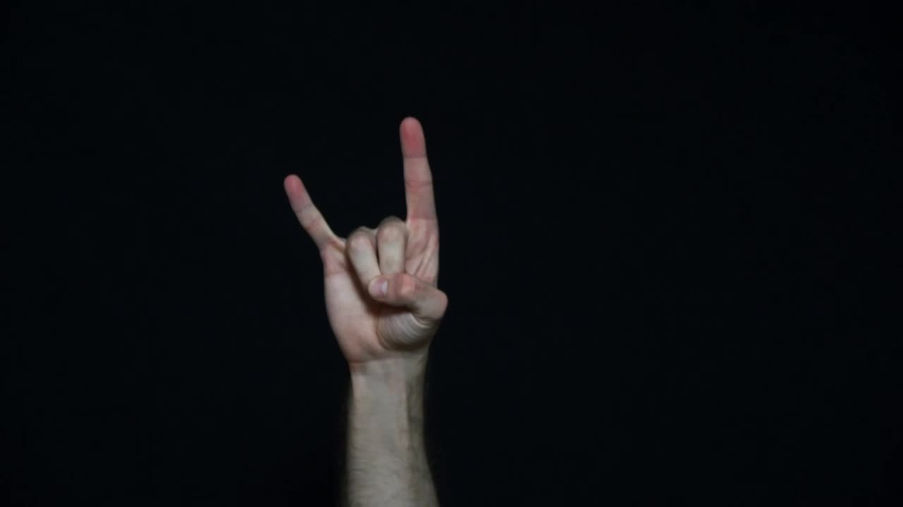 Stock Video Music Fan Making A Hand Gesture Live Wallpaper - Free Download