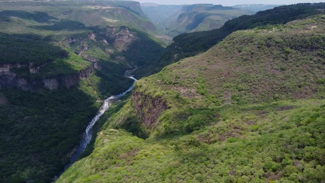 Stock Video Fly Over A Huge Canyon Covered In Vegetation Live Wallpaper For PC - Free Download