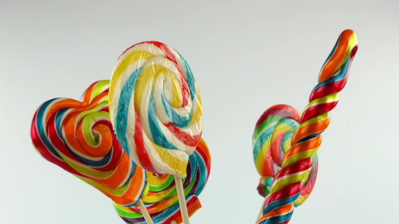 Stock Video Large Rainbow Swirl Lollipops Animated Wallpaper - Free Download
