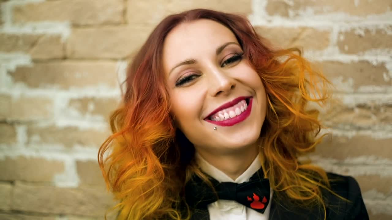 Stock Video Happy Woman Wearing Dress And Black Bow Tie Animated Wallpaper - Free Download