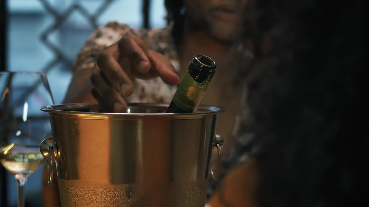 Stock Video Man Pouring Champagne Into His Glass During A Romantic Dat Animated Wallpaper - Free Download