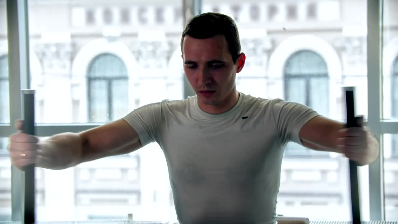 Free Stock Video Young Man Doing Exercises With The Gym Equipment Live Wallpaper - Free Download