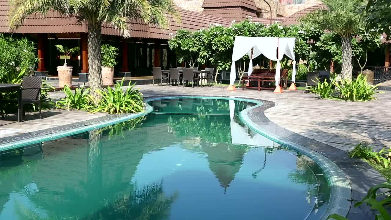 Free Video Stock swiming pool in resort garden Live Wallpaper - Free Download