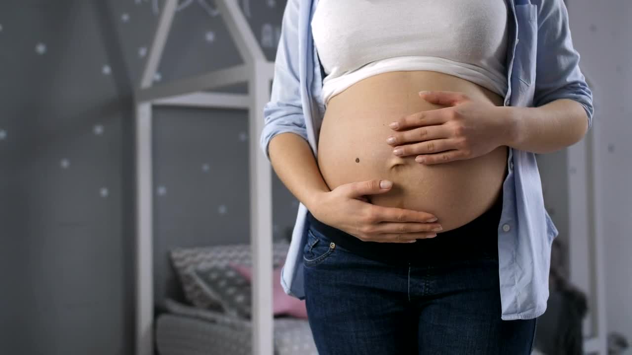 Video Stock Pregnant Woman Holding Her Belly Live Wallpaper Free - Free Download