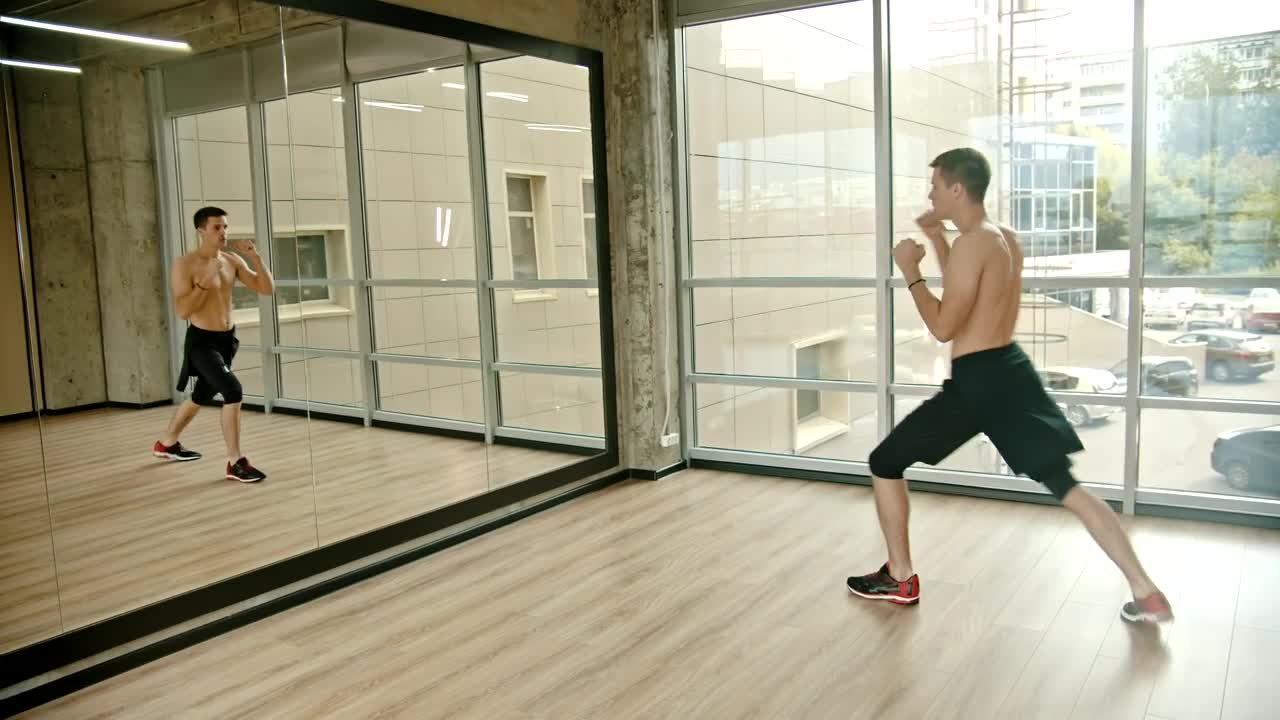 Free Stock Video Young Man Practicing Martial Arts In A Mirror Live Wallpaper - Free Download