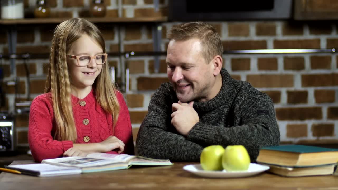 Stock Video Dad Helping His Daughter With Her Homework Live Wallpaper For PC - Free Download