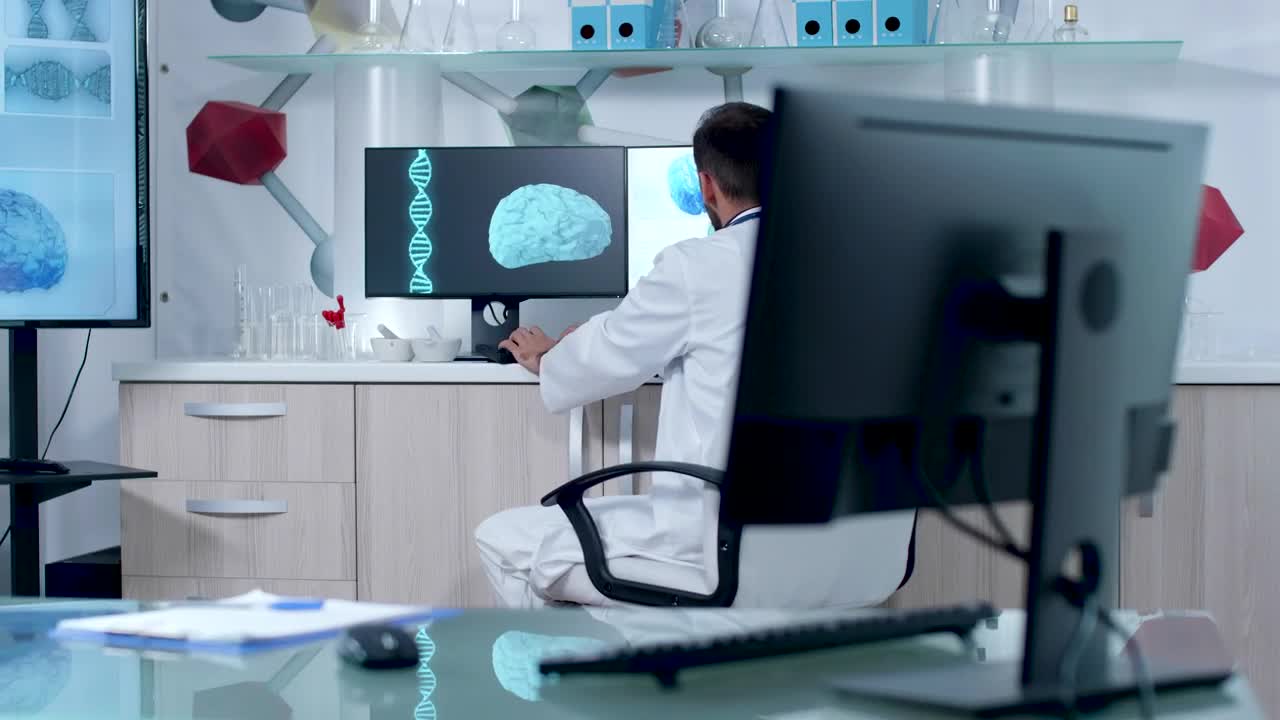 Stock Video Doctor Working On Dna And Brain Models In Lab Live Wallpaper For PC - Free Download