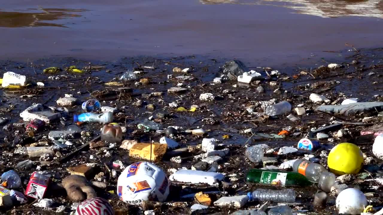 Stock Video Garbage Floating In A Polluted Lake Live Wallpaper For PC - Free Download