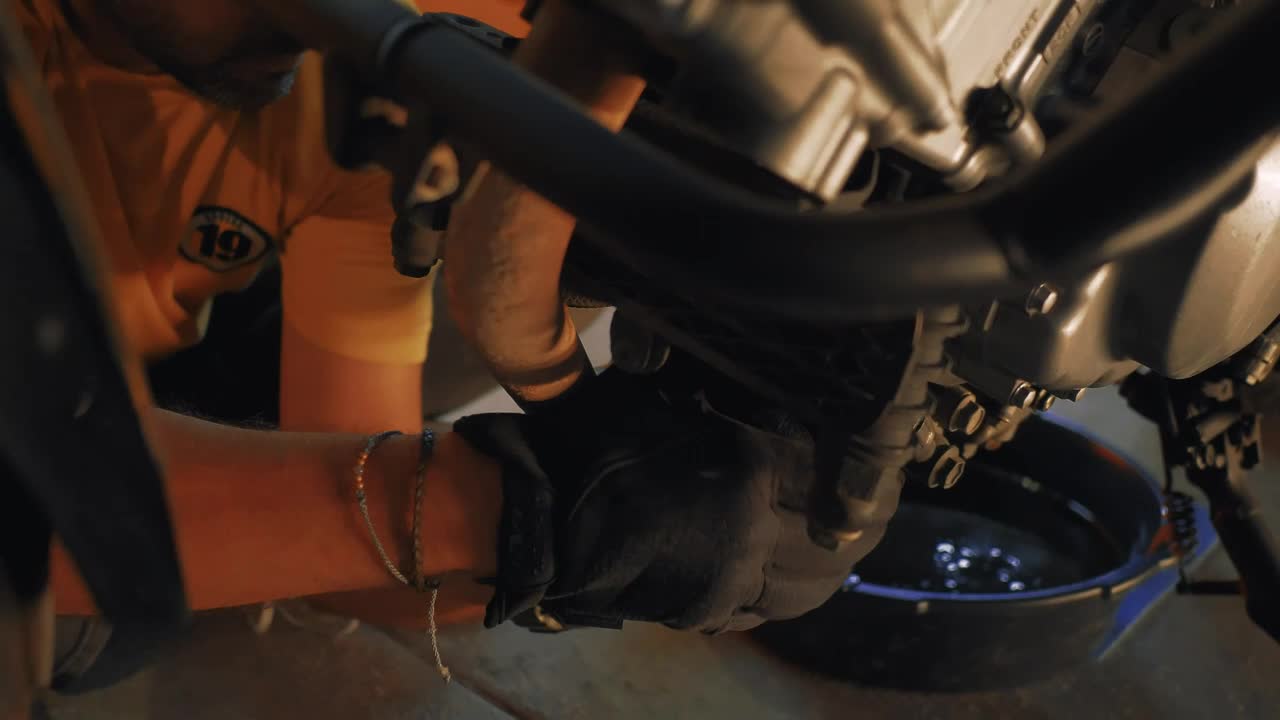 Stock Video Man Maintaining A Motorcycl Animated Wallpaper - Free Download