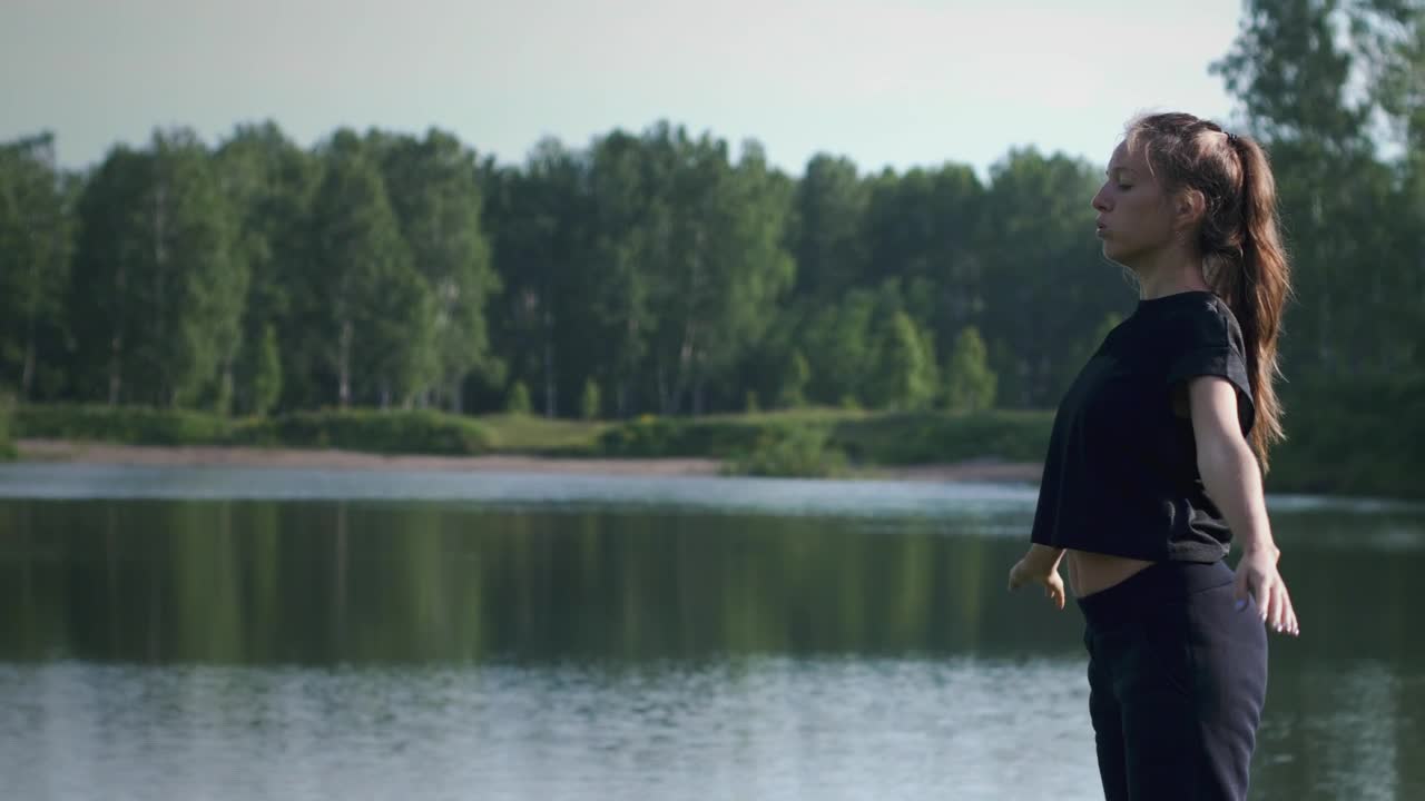 Free Stock Video Woman Practicing Breathing Exercises By The Lake Live Wallpaper - Free Download