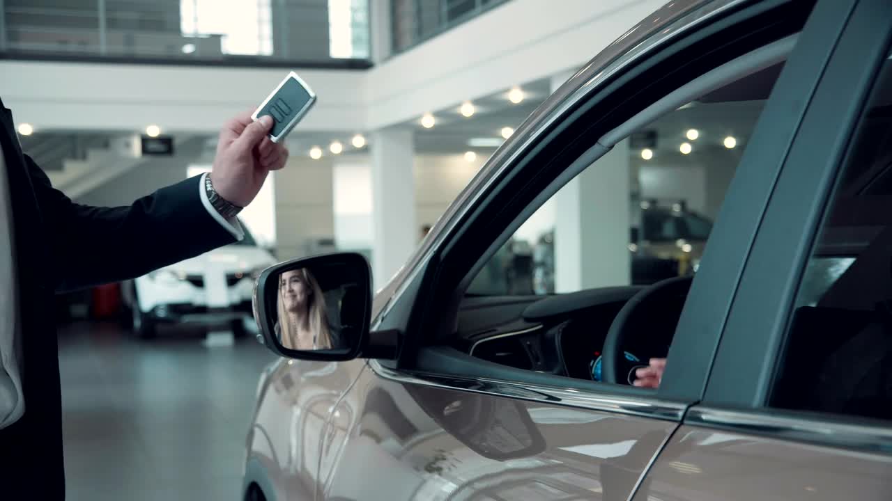 Stock Video Giving A Car Key To Client Live Wallpaper For PC - Free Download