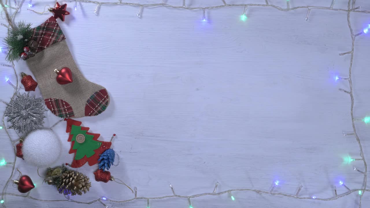 Stock Video Frame With Christmas Decorations And A Wrapped Gift Live Wallpaper For PC - Free Download