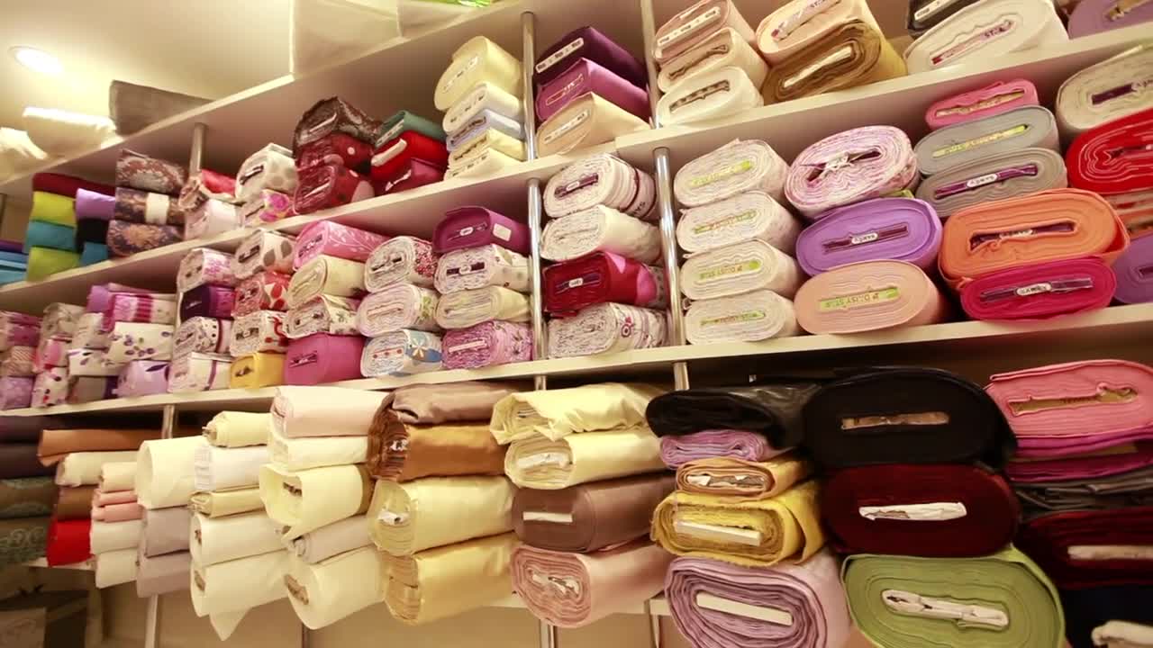 Free Stock Video Shelf Full Of Fabric Rolls In A Store Live Wallpaper - Free Download