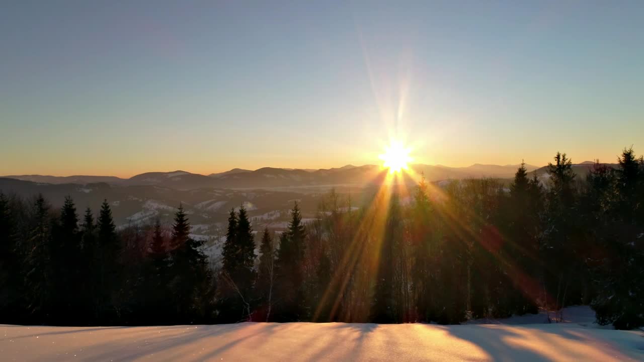 Free Video Stock sunrise sun flare in the snowy mountains Live Wallpaper - Free Download